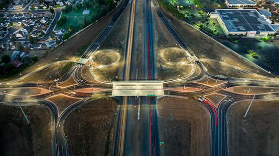 Time lapse photo of vehicles driving on highway